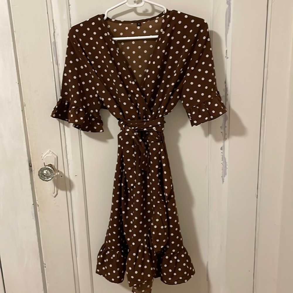 Polkadot dress, with light cream dots, runs small